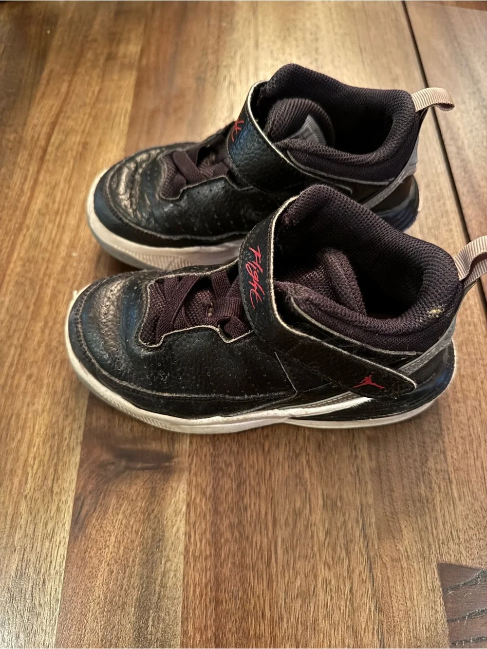 Jordan Kids Black Sneakers with Red 'Flight' Accent